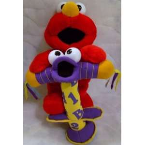  Fisher Price Jump and Learn Elmo Plush Doll Toy: Toys 