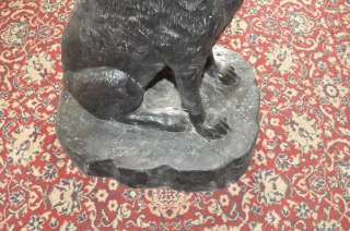 Heres a special one of a kind item. This Wolf sculpture is made of 