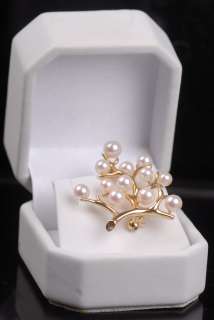 This is a Mikimoto Tree of Life 14K Solid Gold Brooch in excellent 