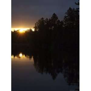  Early Morning Sun is Reflected on the Water of Moosehead 