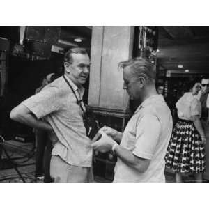 Author Graham Greene Talking with Actor Alec Guinness on Location for 