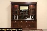 Crafted about 1900 of solid oak, a china cabinet, back bar or server 