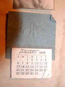 This particular item is a JANUARY 1918 Antique Calendar with Photo of 