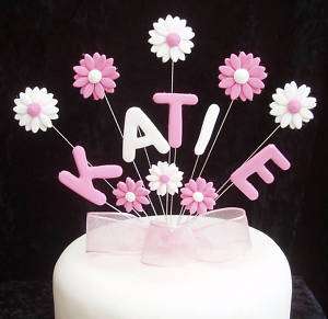 CHRISTENING/HOLY COMMUNION NAME CAKE TOPPER WITH DASIES  
