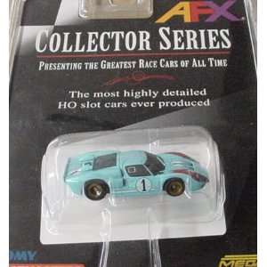   Tomy   Mega G GT 40 Miles lt. blue #1 (Slot Cars) Toys & Games