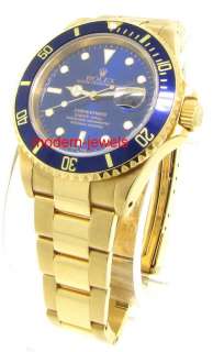 Rolex 16618 Submariner 18k Gold Watch   Blue Dial Mint  