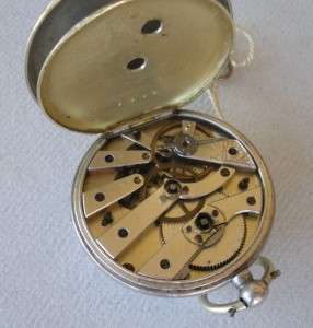 Silver key wound key set pocket watch runs keeps time  