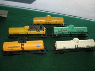 TRAIN HO SCALE LOT OF 5 TANK CARS ONE WATER CAR  