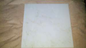 Box of polished White Marble tile 12x12x3/8 with subtle gold veining 