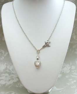 The Hunger Games Mockingjay Inspired Pearl Cage Locket Arrow Lariat 