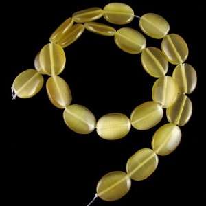   18mm yellow fiber optic cats eye flat oval beads 15