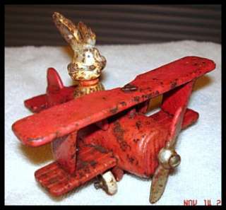 VINTAGE CAST IRON TOY AIRPLANE W/ RABBIT PILOT BUGs BUNNY? OR 