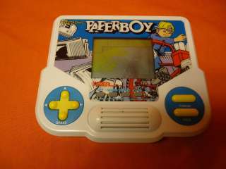Paperboy Tiger Electronic LCD Handheld Arcade Game  